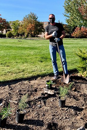 A Deschutes Brewery employee planting milkweed. Photo: Deschutes Brewery.