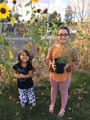 Happy Buff Elementary students with their new milkweed to take home. Photo: Tracey Sklenar.