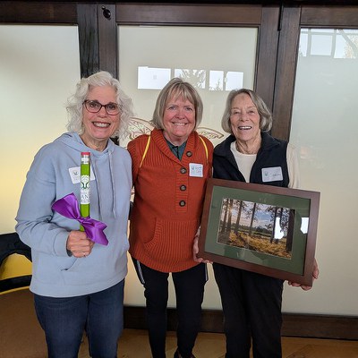 2025 Outstanding Volunteer Award winners: Lezlie Matsuyama and Colleen Egertson. 2025 Lifetime Achievement Award winner: Carol Wall. Photo: Land Trust.