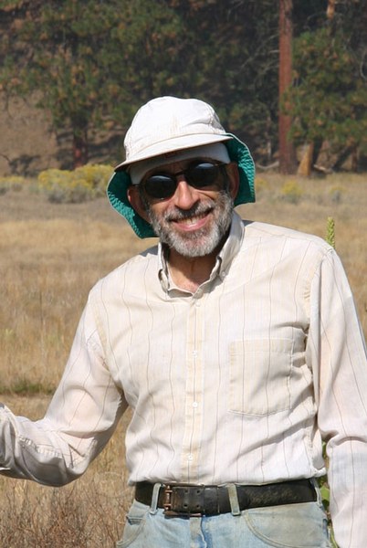 Larry Weinberg volunteering at Camp Polk Meadow Preserve.