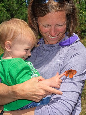 Exploring butterflies at the Metolius Preserve. Photo: Sue Anderson.
