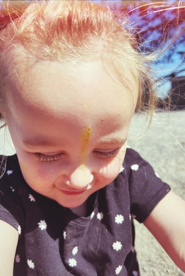 The author's three year old accessorizes with mica powder. Photo: Nicole Gricius.