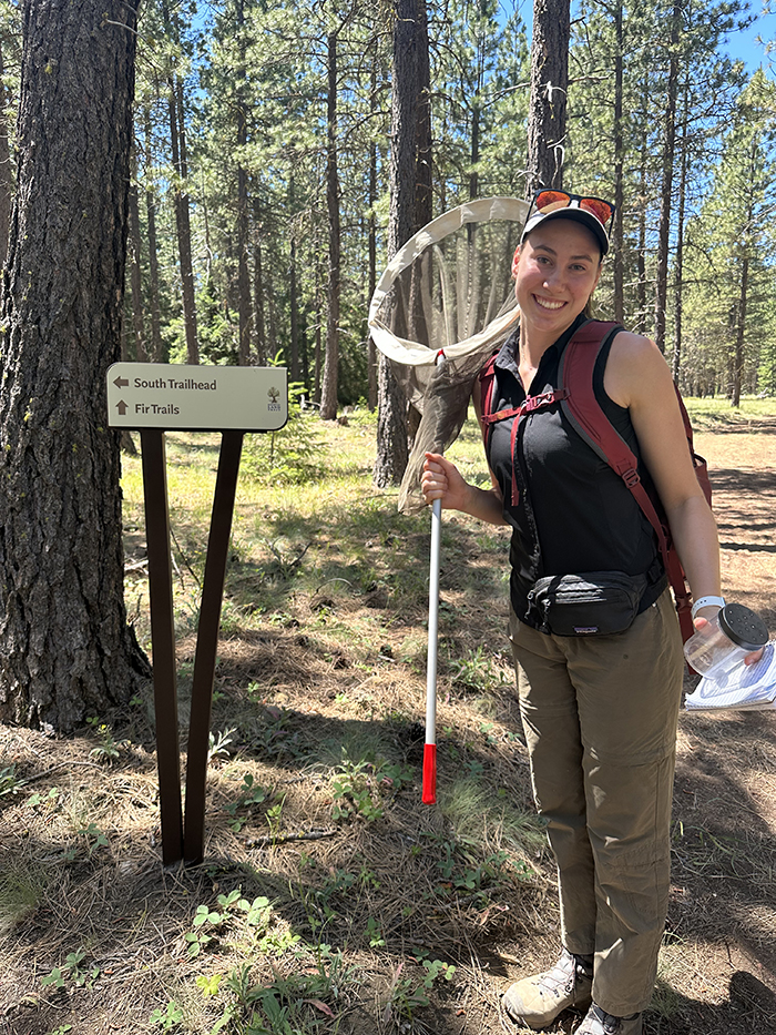 Serena Turner poses for a photo at the Metolius Preserve. Photo: Land Trust.