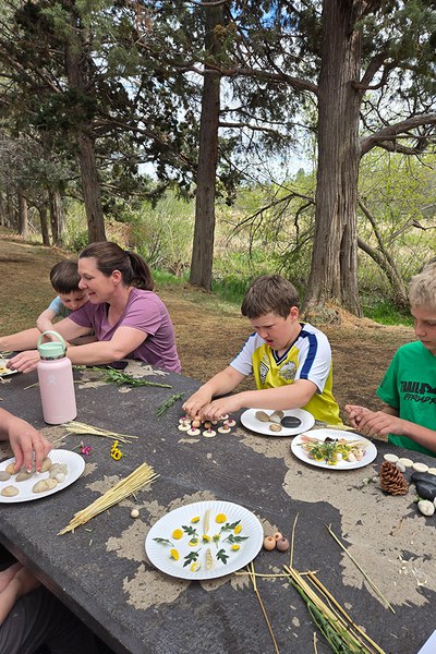 Making mandala art on a Land Trust Nature Kids outing. Photo: Karen Walsh.