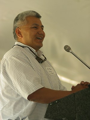 Robert Brunoe, General Manager of Natural Resources and Tribal Historic Preservation Officer for the Confederated Tribes of Warm Springs, speaks at the 2003 dedication of the Metolius Preserve. Photo: Chip Belden.