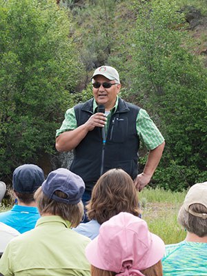 Robert Brunoe, General Manager of Natural Resources and Tribal Historic Preservation Officer for the Confederated Tribes of Warm Springs, speaks at the 2015 dedication of Whychus Canyon Preserve. Photo: Blake Boyd.